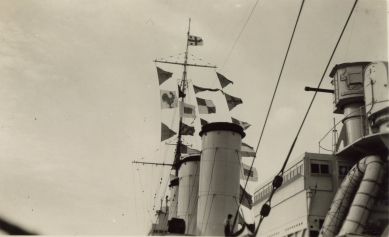 HMS London album. Commission 1929-1931. Flying cock of the fleet flag. Argostoli Greece